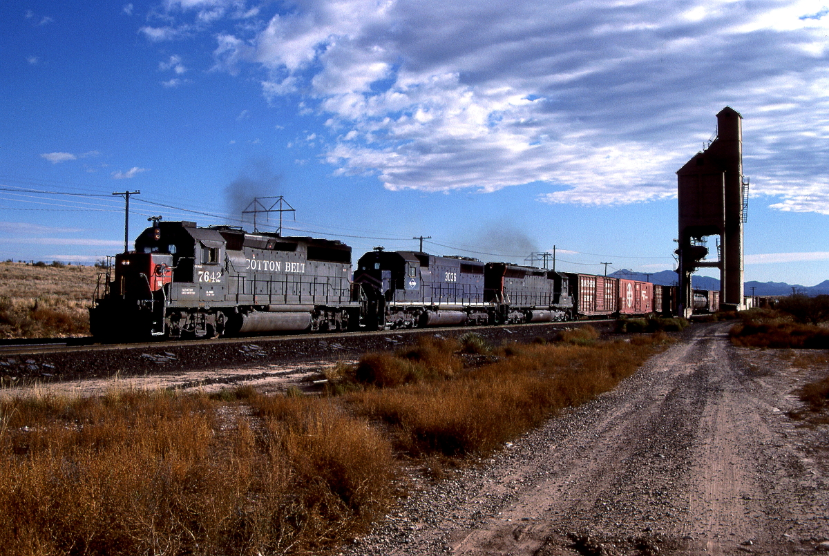 SSW 7642 is a class GP40-2 and  is pictured in Mescal, AZ, USA.  This was taken along the Tucson Lordsburg District on the Southern Pacific Transportation Company. Photo Copyright: Rick Doughty uploaded to Railroad Gallery on 11/27/2023. This photograph of SSW 7642 was taken on Saturday, November 14, 1987. All Rights Reserved. 